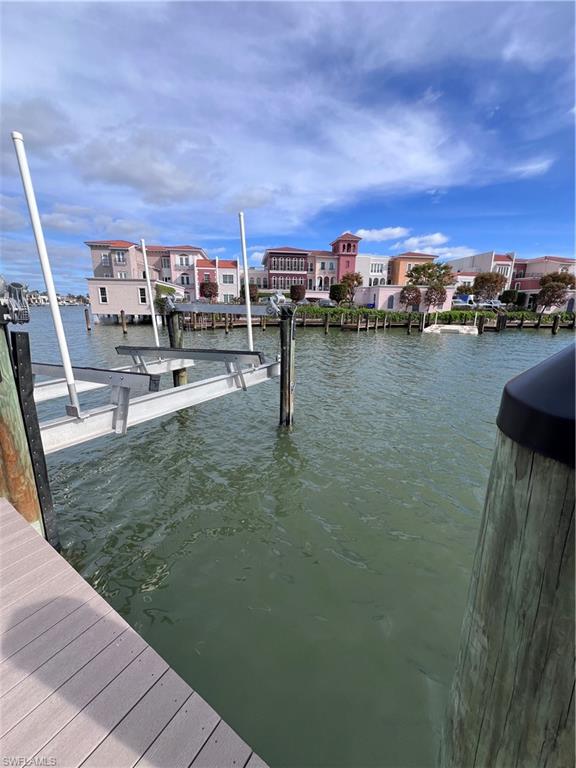 4090 Gulf Shore Boulevard North, Unit 1 Naples, FL 34103 - Photo 7 of 13 a view of a lake