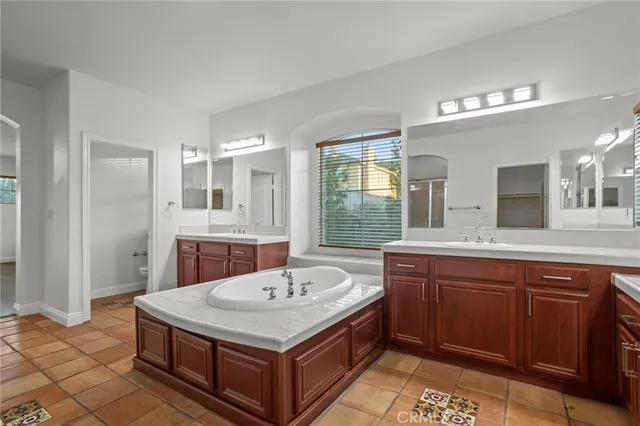 a bathroom with a sink and shower