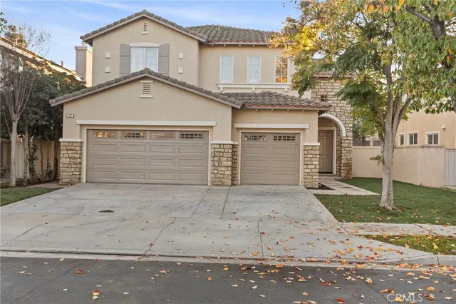 a house view with a garden space