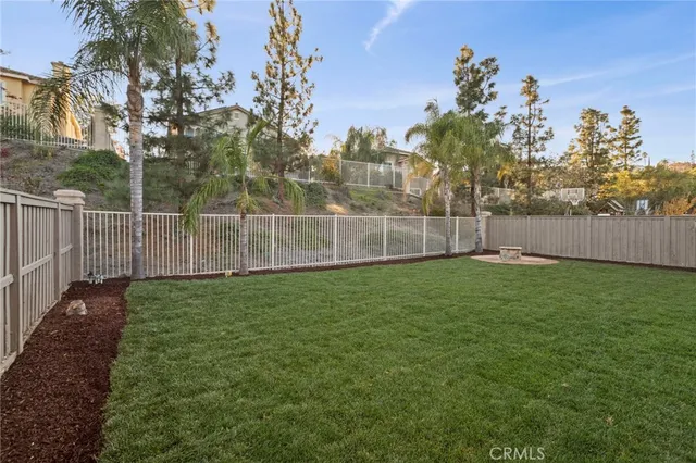 a view of a backyard with a garden