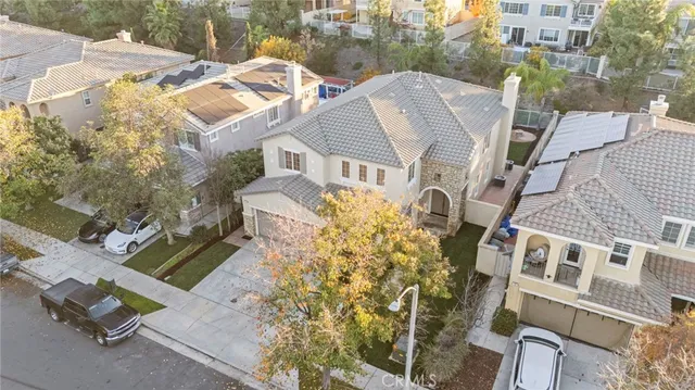 a front view of a residential apartment building with a yard