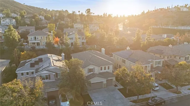 an aerial view of a house with a garden
