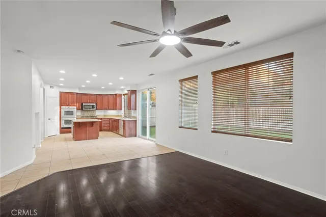 a view of a kitchen with a sink and a window
