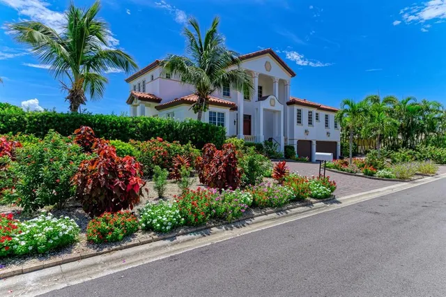 an aerial view of house with yard swimming pool and outdoor seating