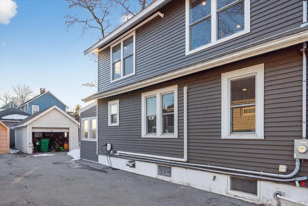 a front view of a house with a garage