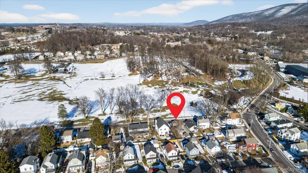 a view of swimming pool with outdoor seating