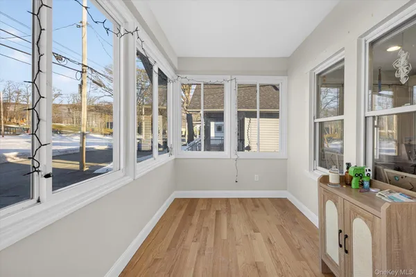 a view of an empty room with a large window