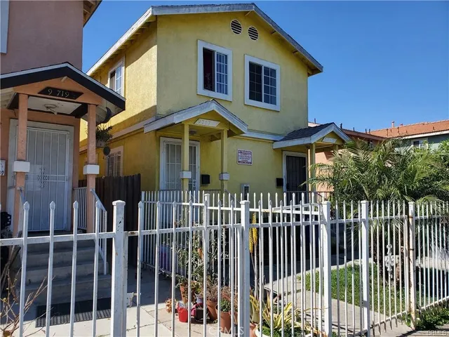 a front view of a house with a porch