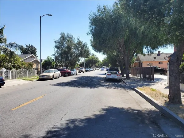 a view of a street with houses