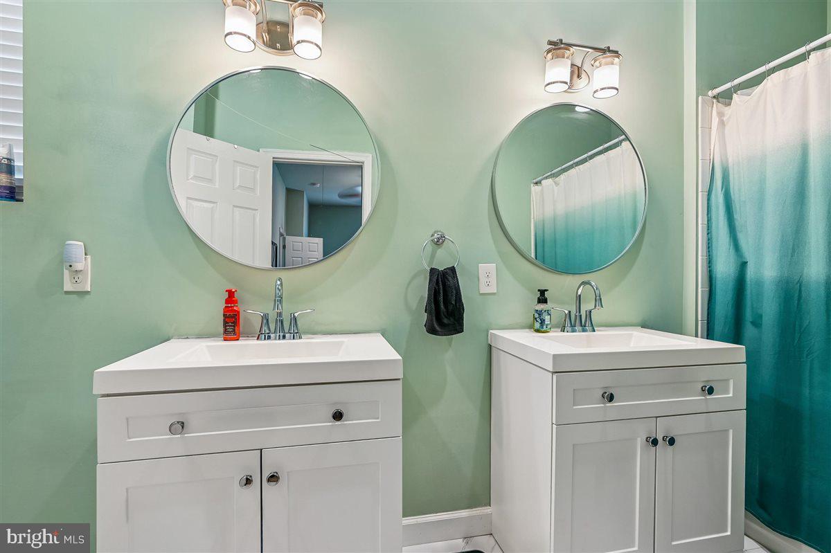 4316 Spencer Street Halethorpe, MD 21227 - Photo 15 of 30 Primary bathrm w/ dual sinks and shower