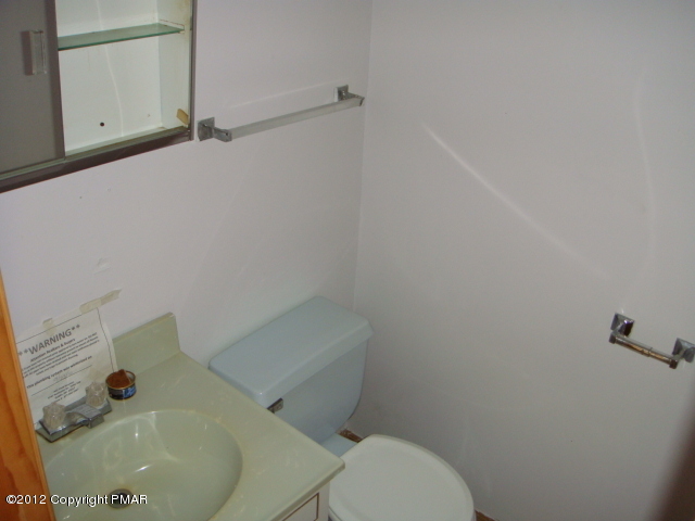 2384 Decker Road Bushkill, PA 18324 - Photo 7 of 10 a bathroom with a sink and toilet