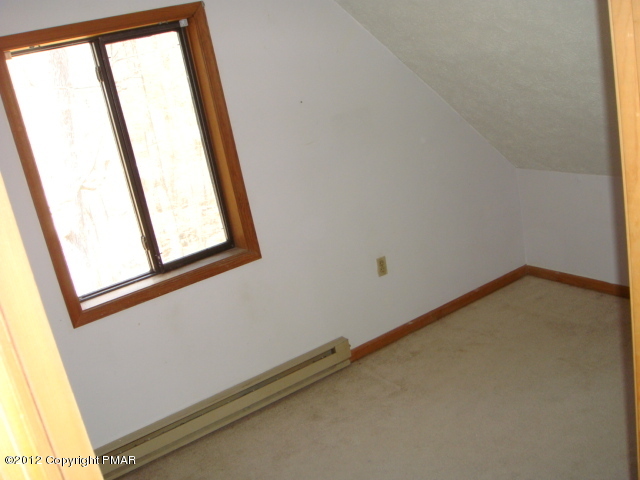 2384 Decker Road Bushkill, PA 18324 - Photo 8 of 10 a small space with wooden floor and a window