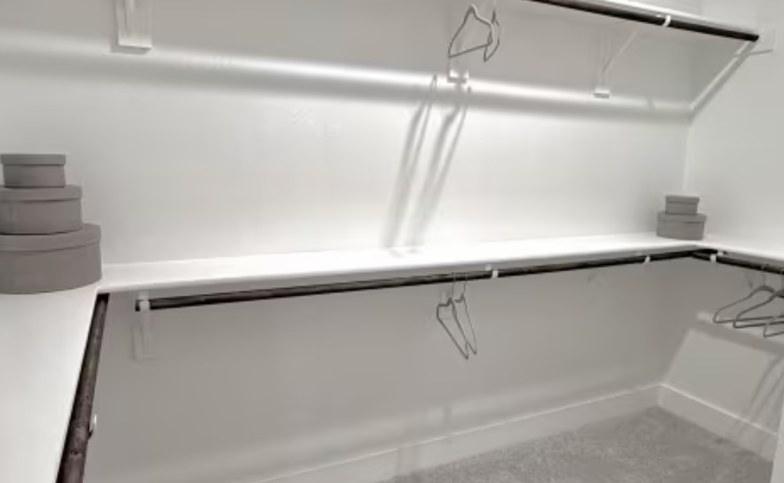 131 Sincere Drive Kyle, TX 78640 - Photo 13 of 15 a view of a room with racks on the wall