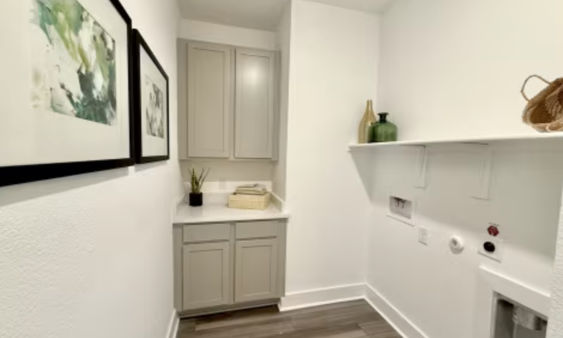 131 Sincere Drive Kyle, TX 78640 - Photo 14 of 15 a bathroom with a sink and a mirror