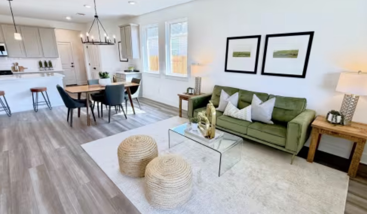 131 Sincere Drive Kyle, TX 78640 - Photo 5 of 15 a living room with furniture and a chandelier