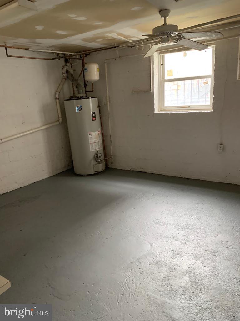 141 Galveston Place Southwest Washington, DC 20032 - Photo 18 of 27 a view of a room with racks on the wall