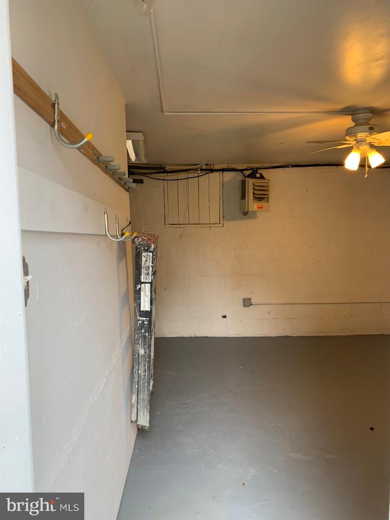 141 Galveston Place Southwest Washington, DC 20032 - Photo 22 of 27 a view of walk in closet with clothes and window