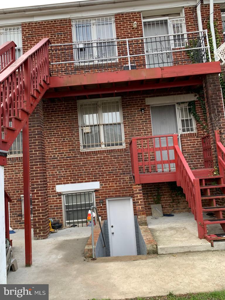 141 Galveston Place Southwest Washington, DC 20032 - Photo 26 of 27 a front view of a multi story building