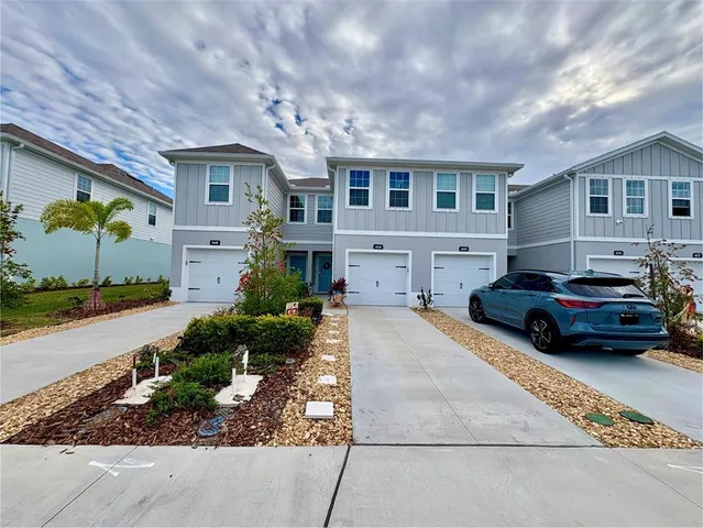 a house view with a garden space