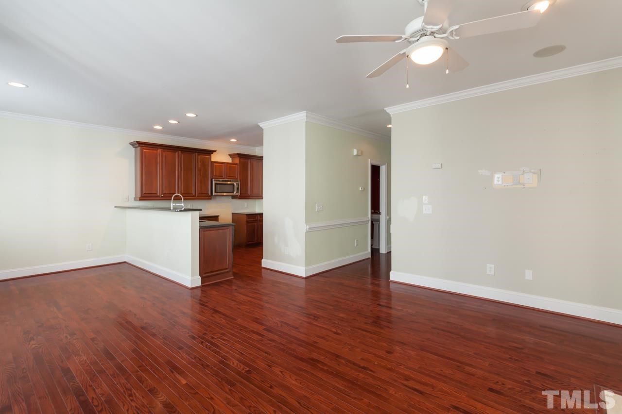 1232 Harp Street Raleigh, NC 27604 - Photo 14 of 25 a view of a kitchen with a sink and a stove top oven