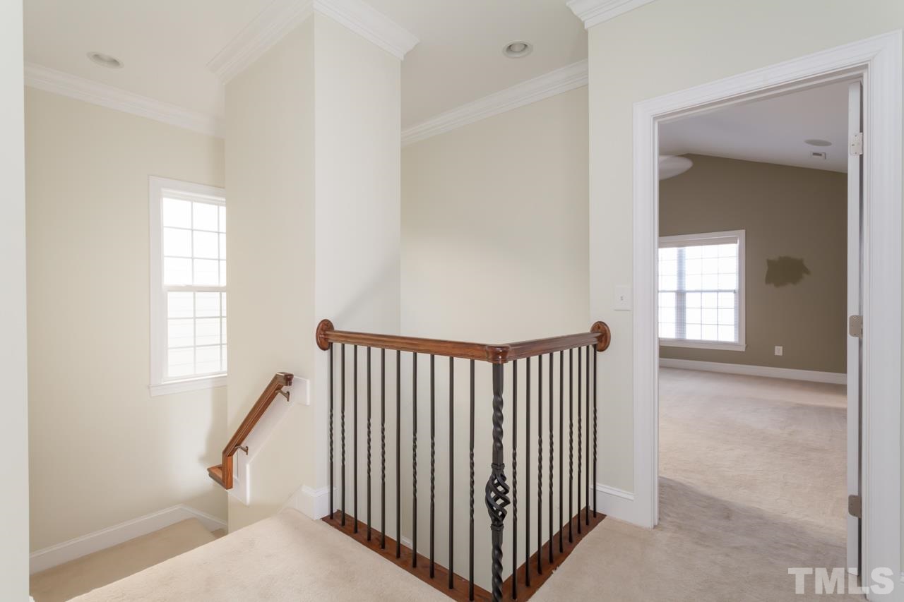 1232 Harp Street Raleigh, NC 27604 - Photo 25 of 25 a view of a hallway with windows