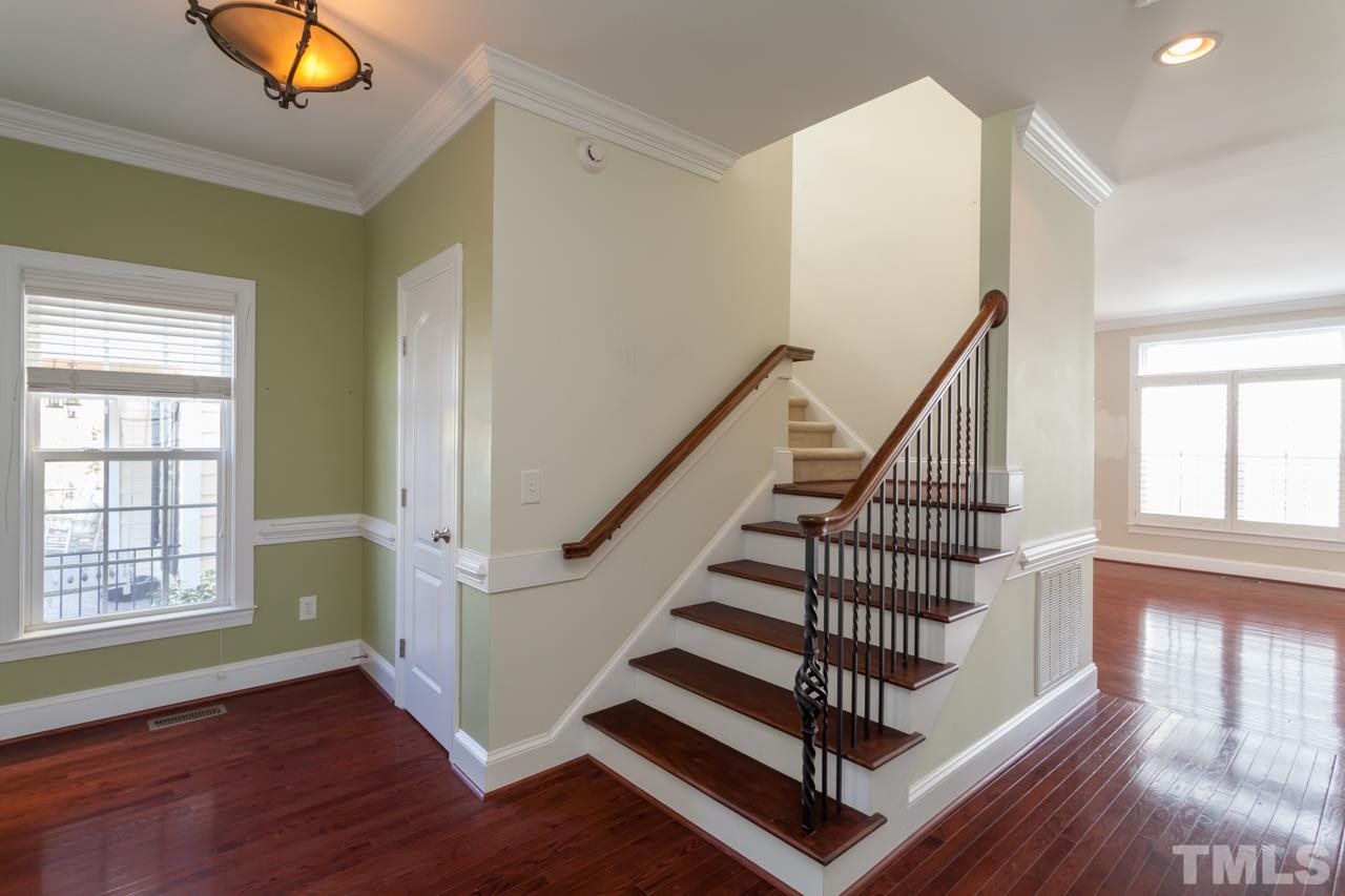 1232 Harp Street Raleigh, NC 27604 - Photo 6 of 25 a view of entryway with wooden floor and window