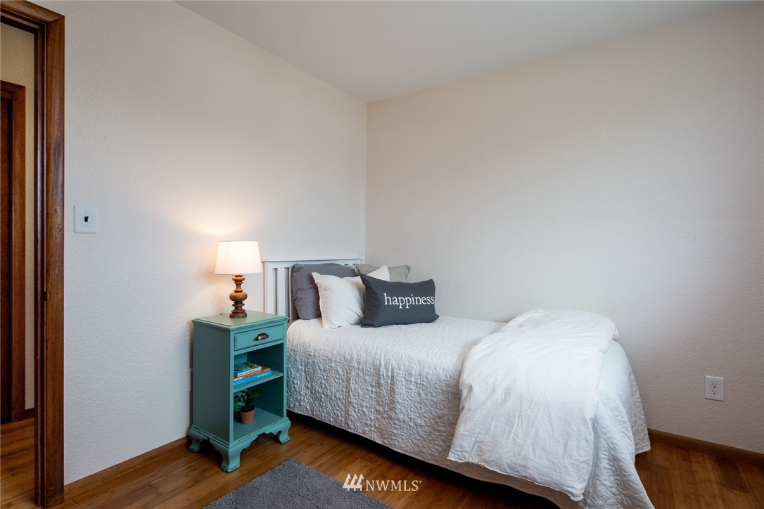 1506 Pangborn Road Lynden, WA 98264 - Photo 14 of 40 a bedroom with a bed and a window