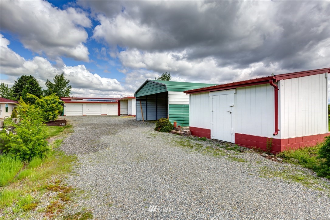 1506 Pangborn Road Lynden, WA 98264 - Photo 23 of 40 a view of a house with backyard and garden