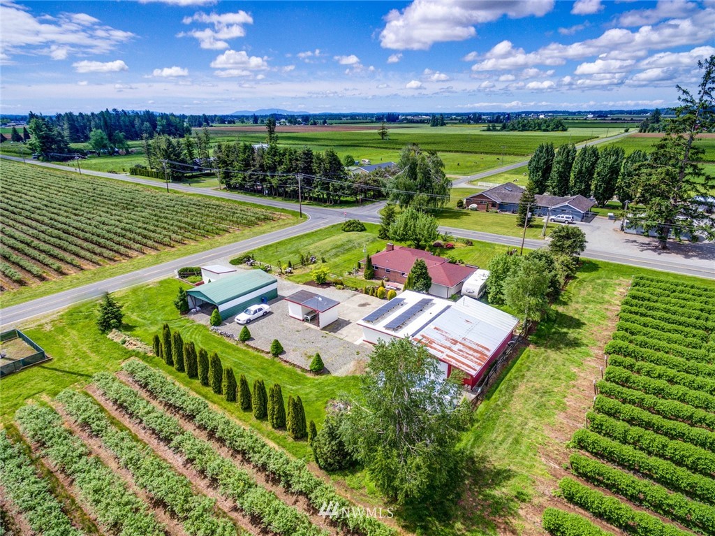 1506 Pangborn Road Lynden, WA 98264 - Photo 40 of 40 a view of a garden with an outdoor space and seating