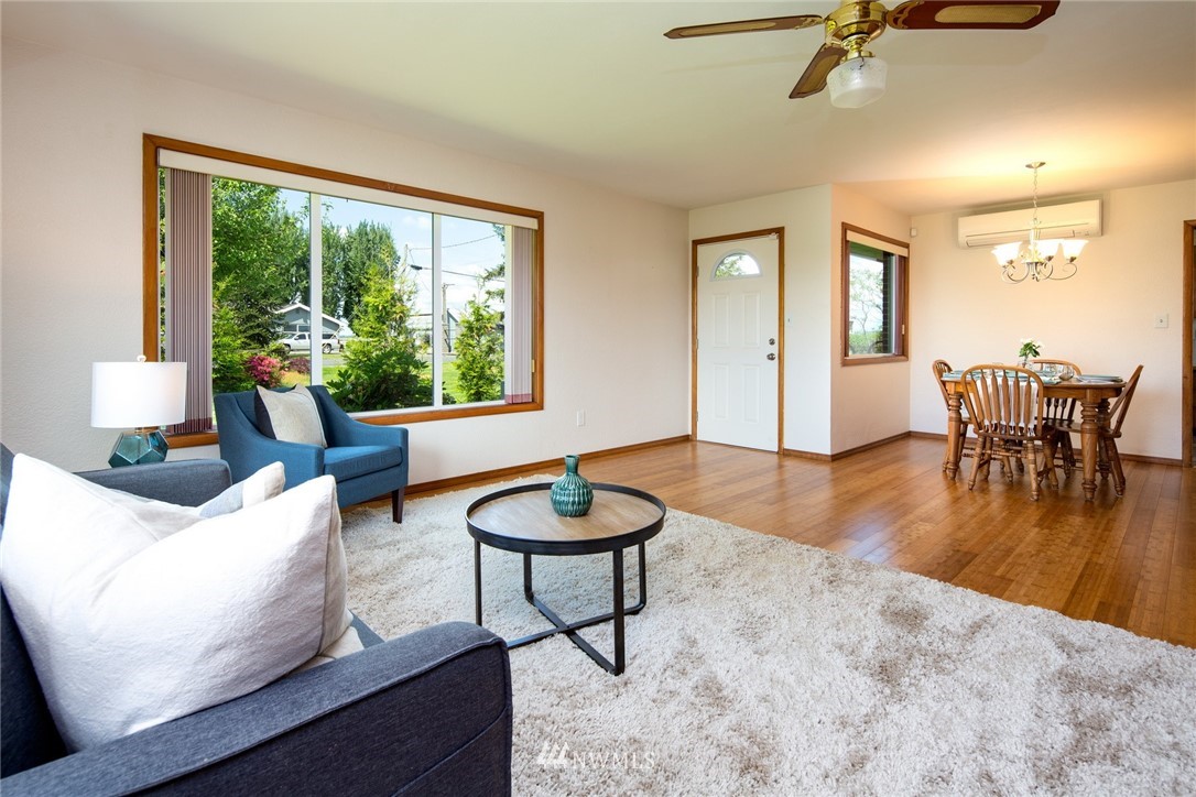 1506 Pangborn Road Lynden, WA 98264 - Photo 5 of 40 a living room with furniture and a window