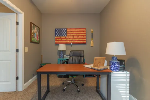a room with furniture and air hockey table