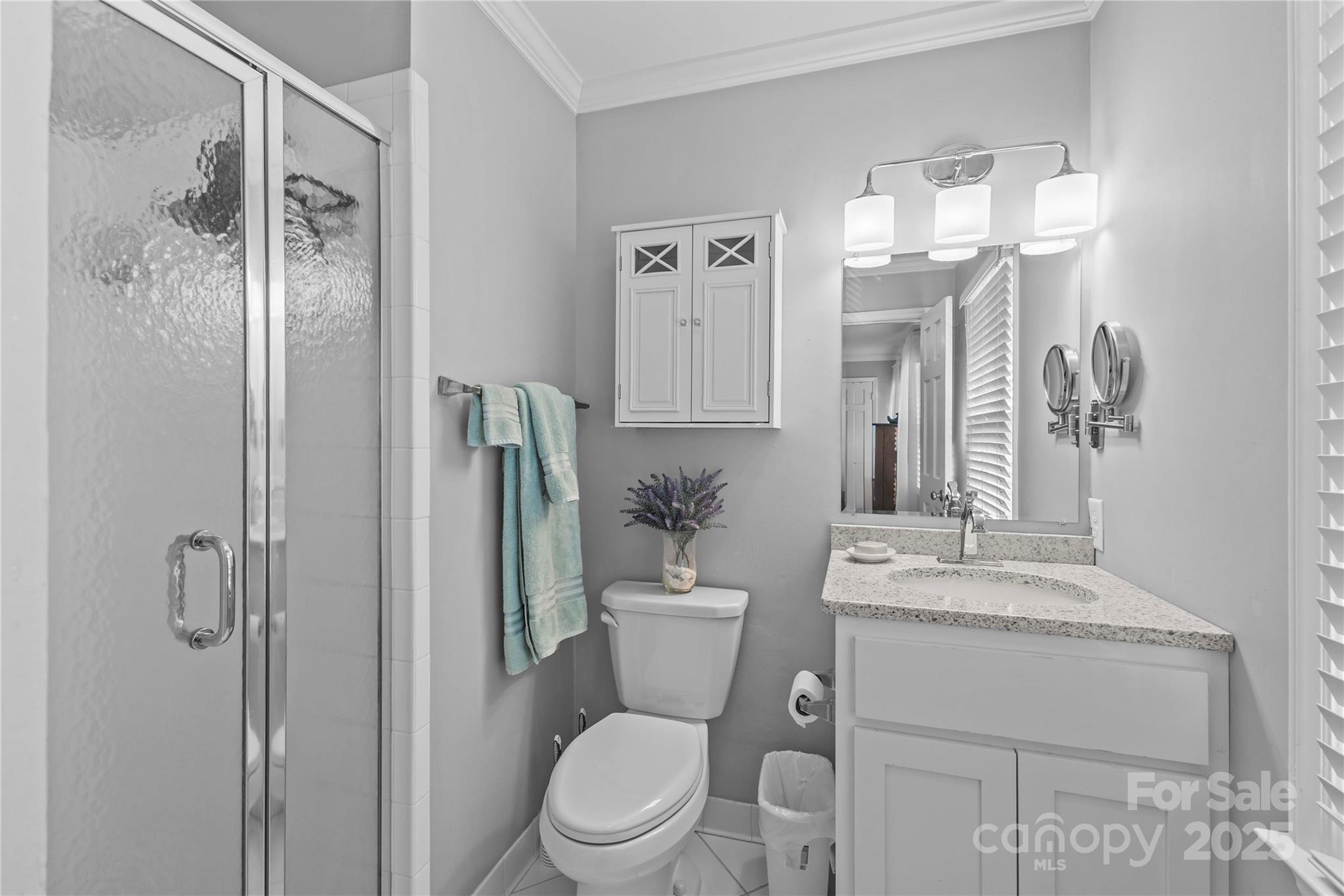 2502 Round Table Road, Unit D Monroe, NC 28110 - Photo 14 of 21 a bathroom with a toilet a sink and shower