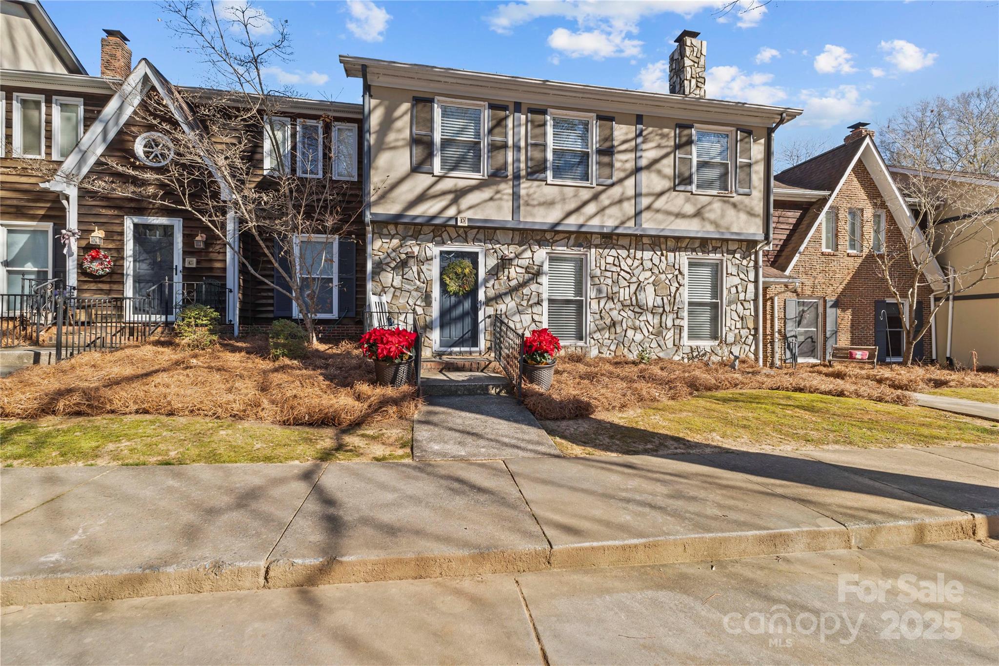 2502 Round Table Road, Unit D Monroe, NC 28110 - Photo 21 of 21 a view of a house with large windows