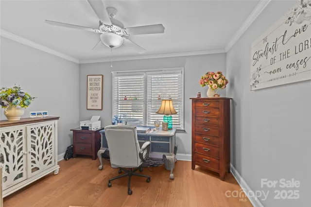 a workspace with furniture and window