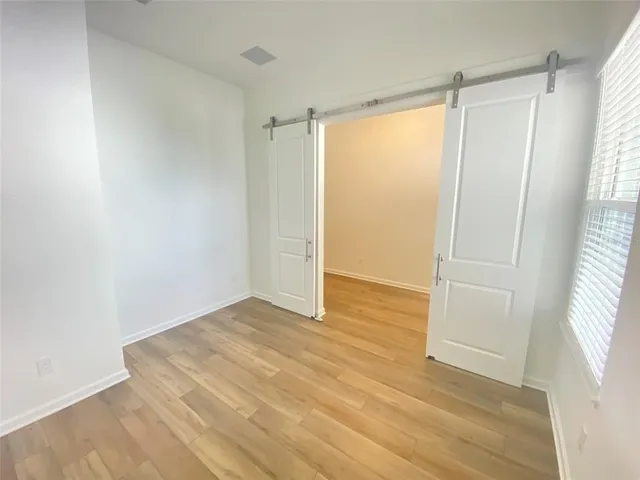 a view of an empty room and window