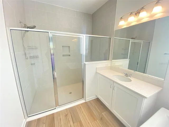 a bathroom with a tub and sink