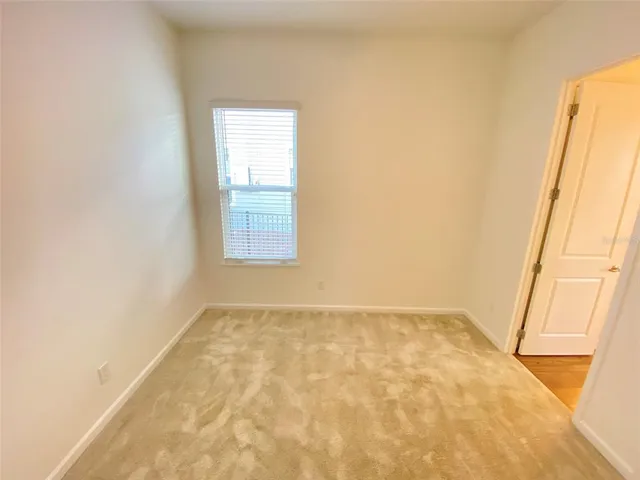 an empty room with a natural light