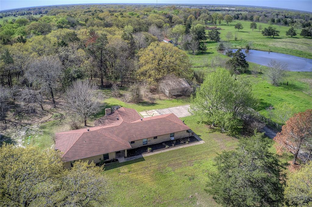 377 County Road 3501 Quinlan, TX 75474 - Photo 1 of 1 an aerial view of a house with a yard
