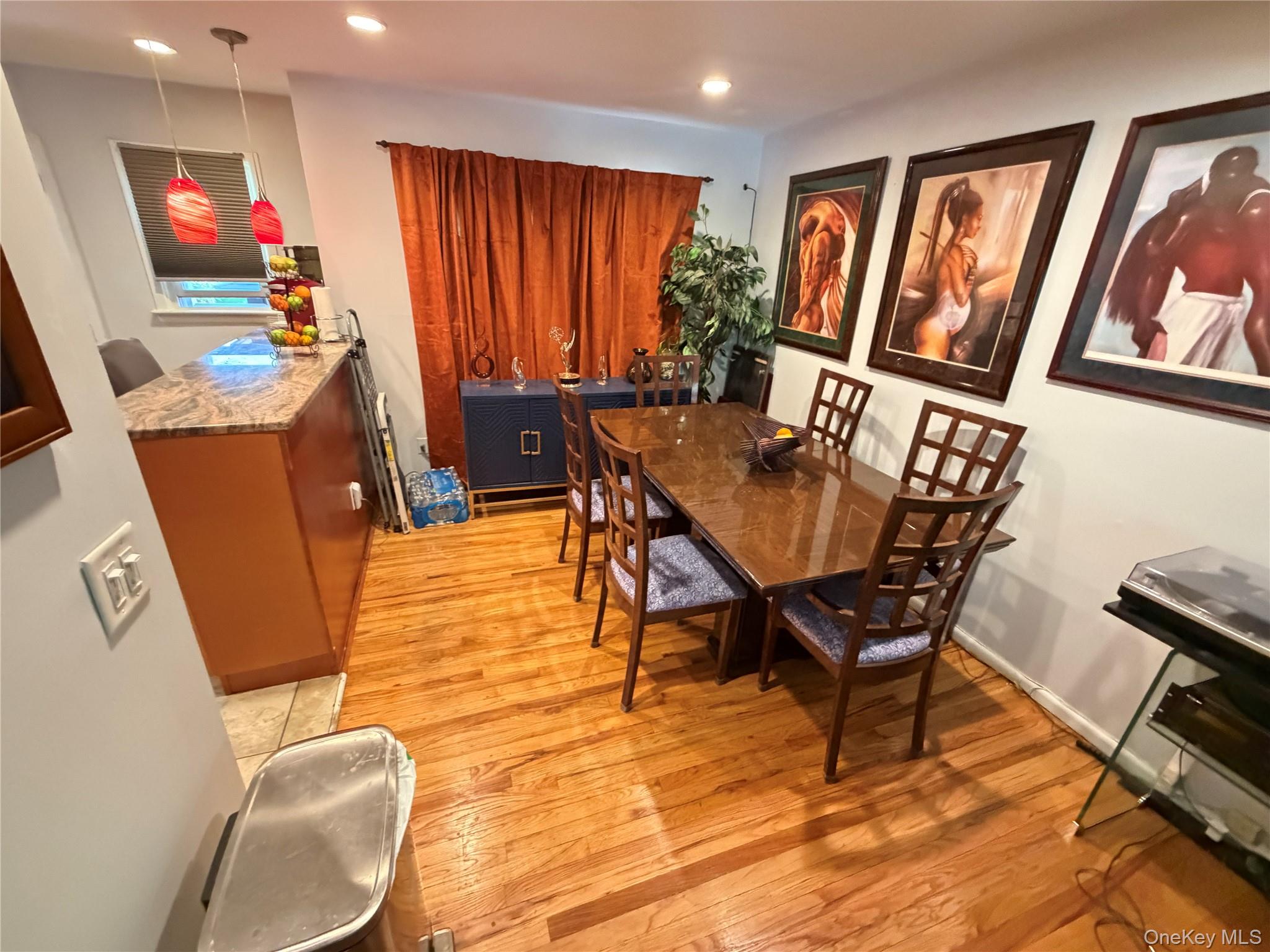 17 Mallory Road Spring Valley, NY 10977 - Photo 9 of 26 a view of a dining room with furniture window and wooden floor