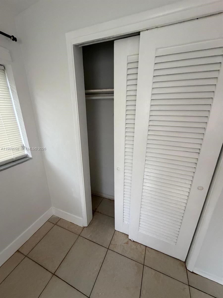 5411 Ravenswood Road, Unit 6 Dania Beach, FL 33312 - Photo 6 of 7 a view of storage and utility room with closet