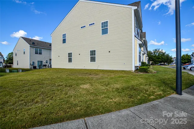a house view with a backyard space