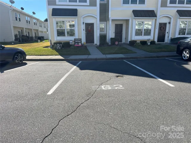 a view of a building with a yard