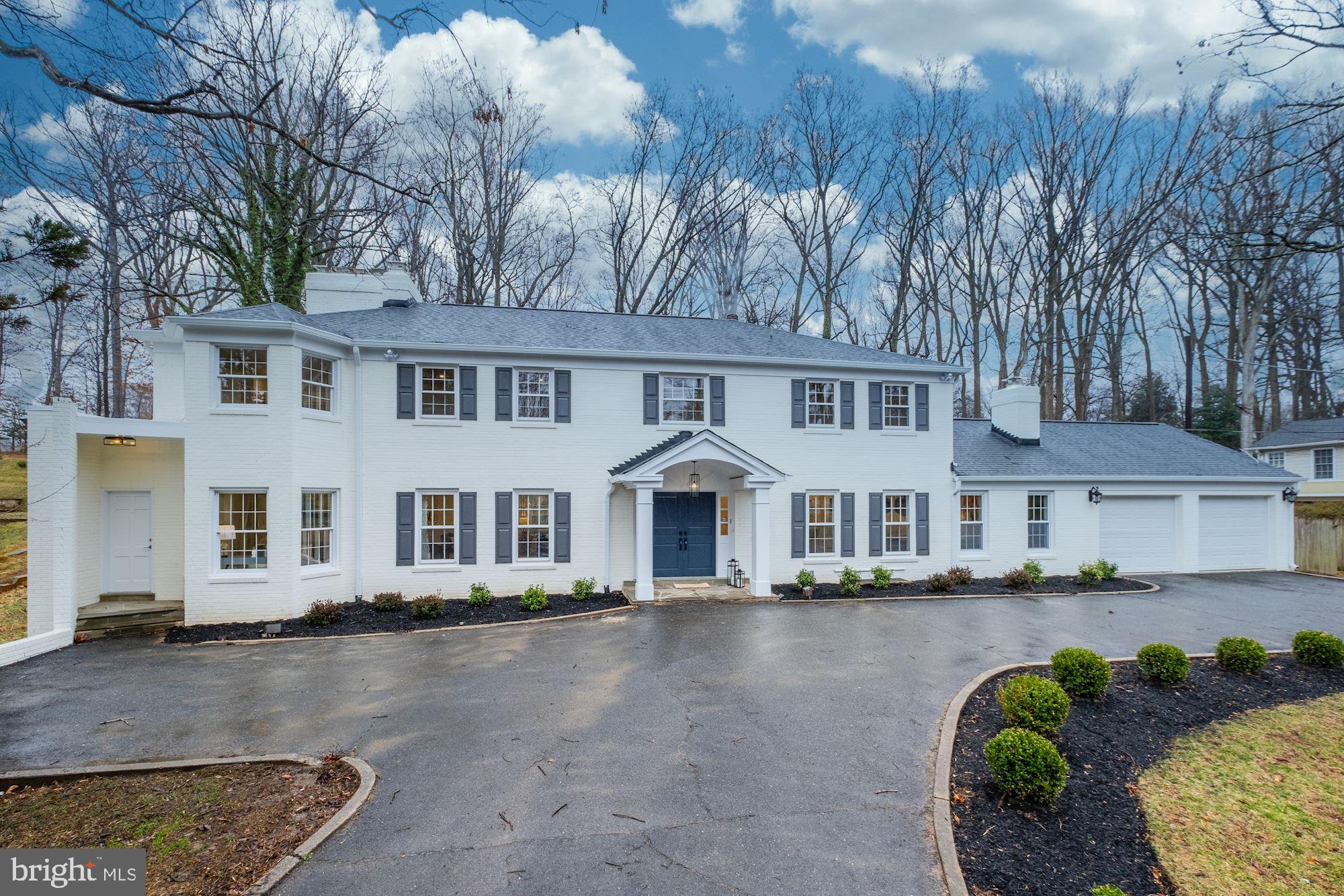 7440 Arrowood Road Bethesda, MD 20817 - Photo 3 of 79 a front view of a house with a yard