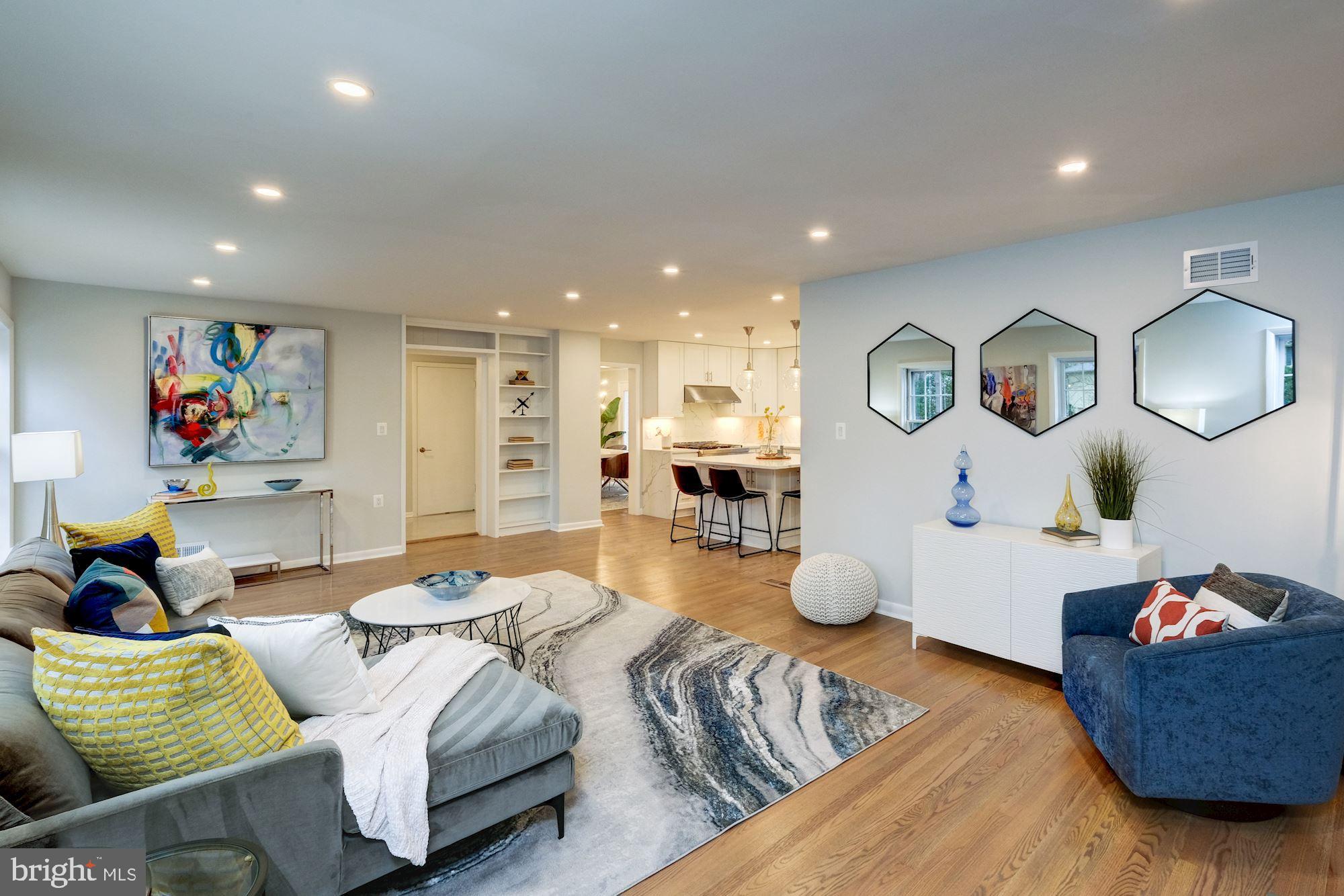 7440 Arrowood Road Bethesda, MD 20817 - Photo 32 of 79 a living room with furniture and a couch