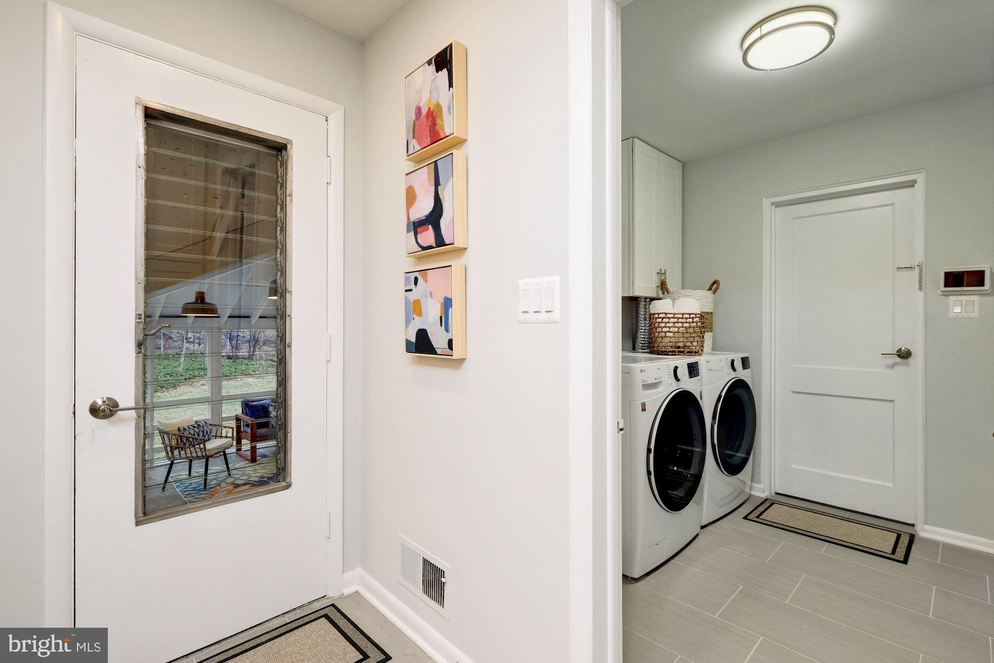 7440 Arrowood Road Bethesda, MD 20817 - Photo 33 of 79 a utility room with dryer and washer