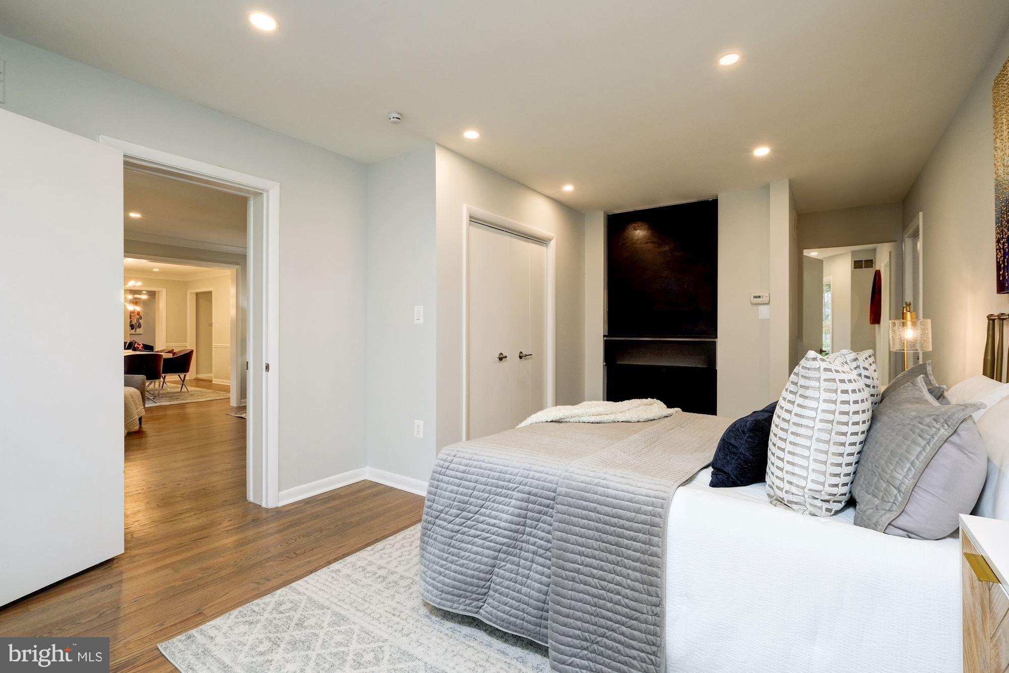 7440 Arrowood Road Bethesda, MD 20817 - Photo 42 of 79 a room with a bed and a television