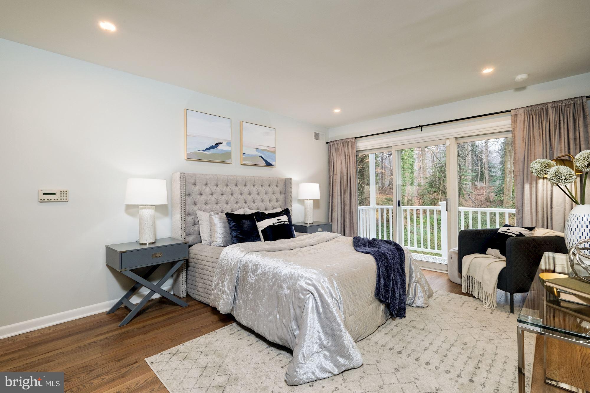 7440 Arrowood Road Bethesda, MD 20817 - Photo 45 of 79 a bedroom with a bed and a large window