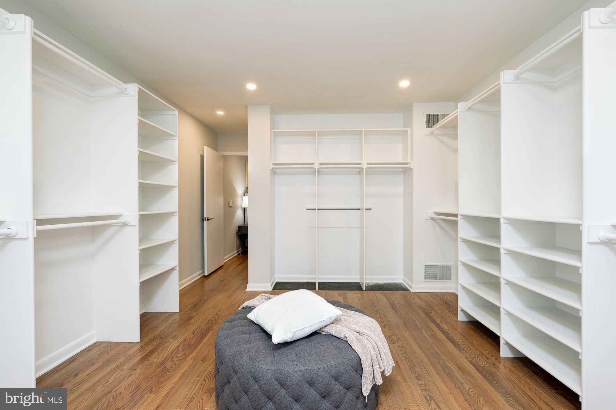 7440 Arrowood Road Bethesda, MD 20817 - Photo 55 of 79 a bedroom with a bed and a walk in closet