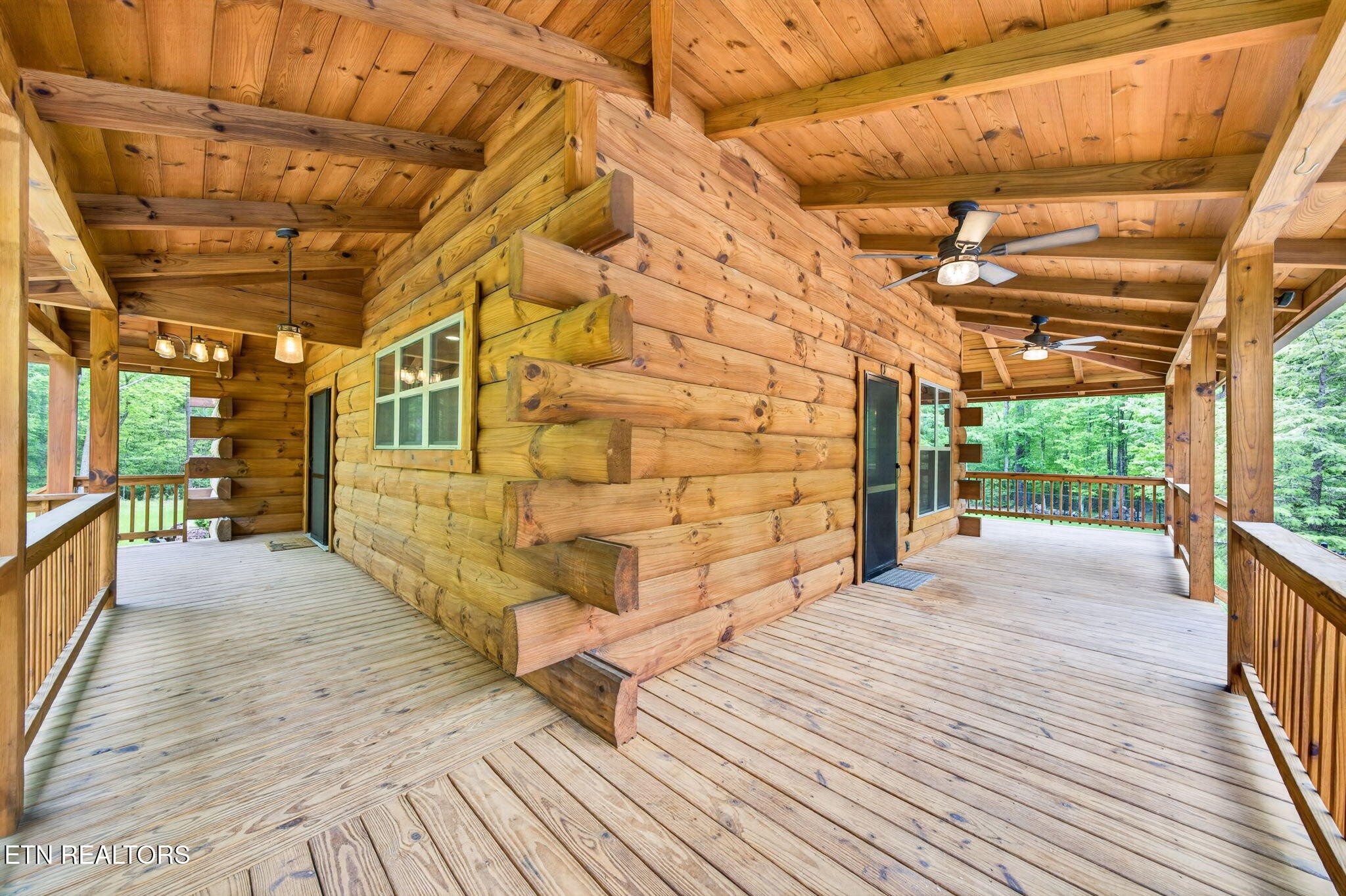 704 White Oak Road Monterey, TN 38574 - Photo 14 of 60 a view of a patio with wooden floor
