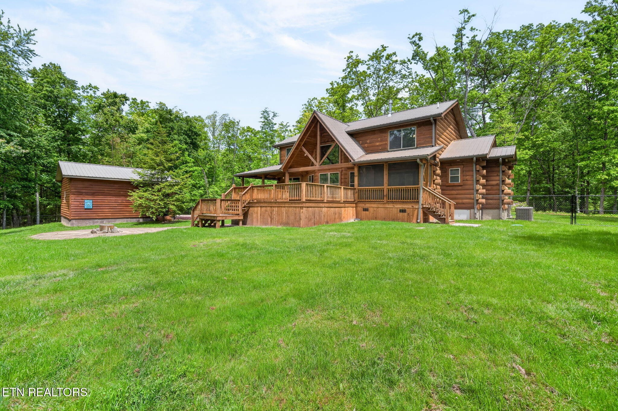 704 White Oak Road Monterey, TN 38574 - Photo 24 of 60 a front view of house with yard and green space